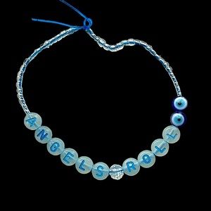 Angels Roll Their Eyes Cruel Summer Eras Tour 2 homemade friendship bracelets